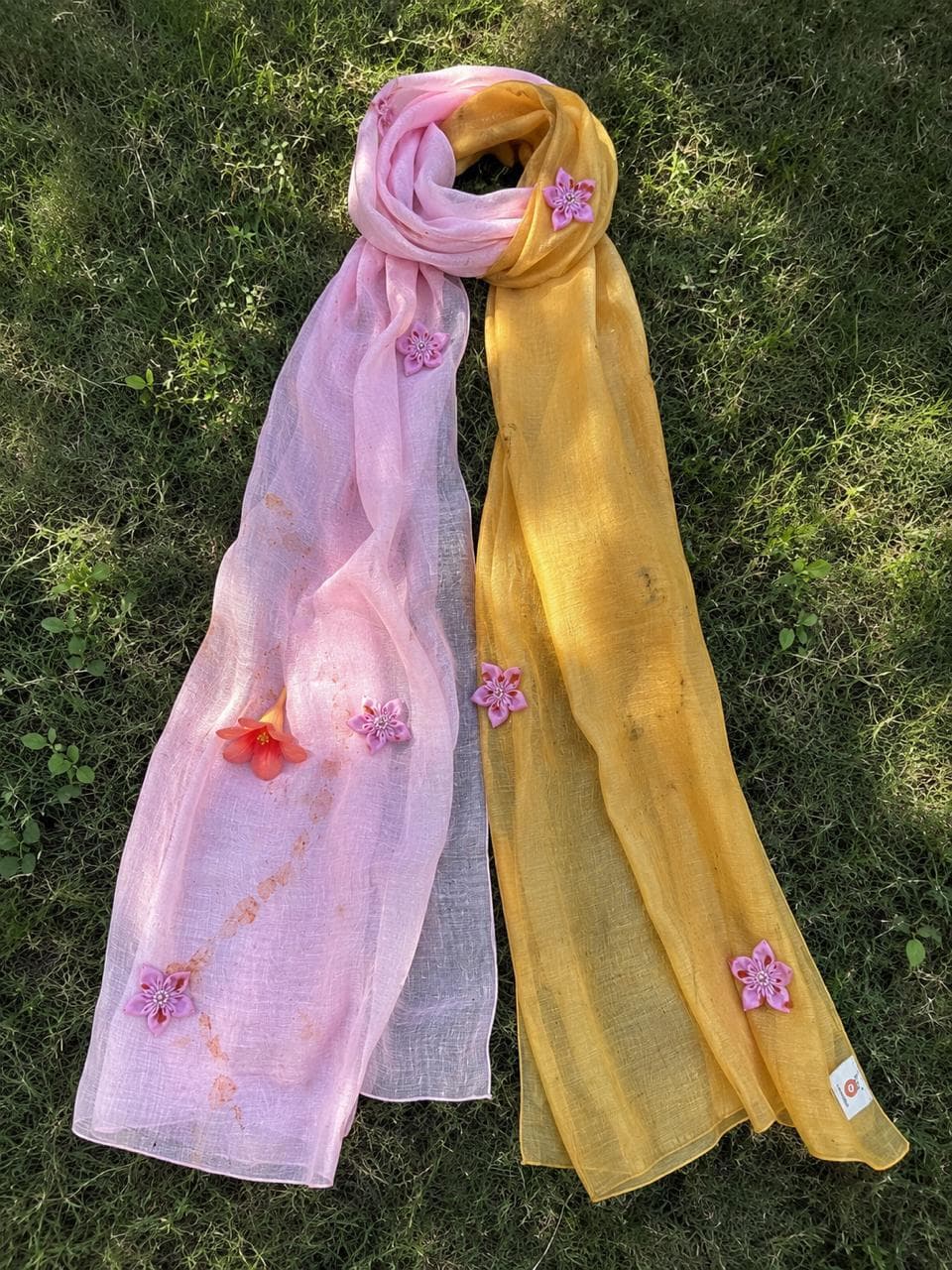 Rekha scarf in mul cotton naturally dyed in marigold yellow and sappanwood pink with scattered handmade flower embellishments - SewMuchBetter